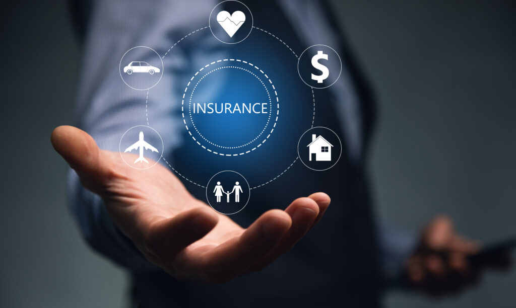 young-man-holding-phone-with-insurance-icon