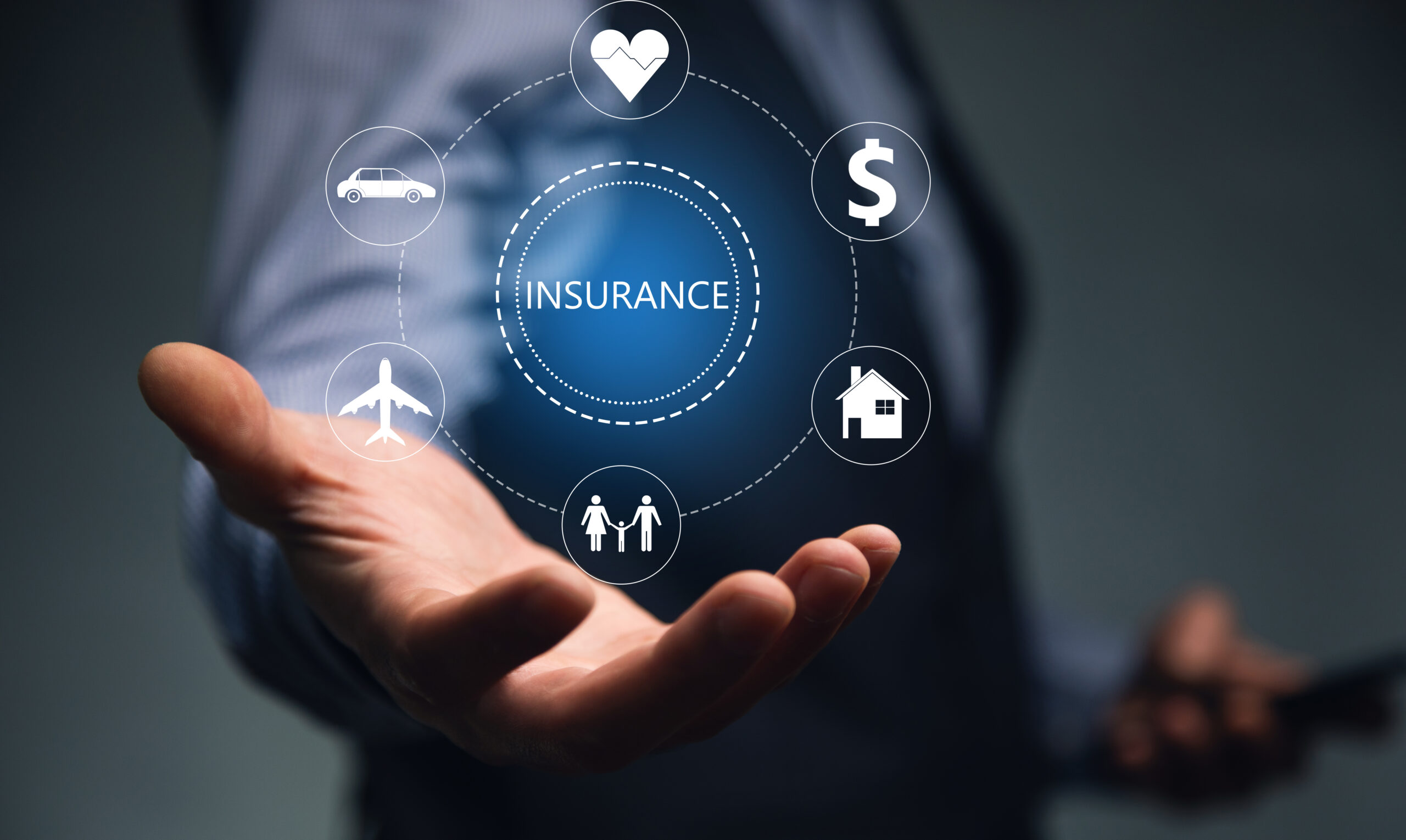 young-man-holding-phone-with-insurance-icon