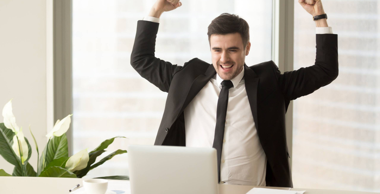 businessman-excited-because-achievement-business-min (1)