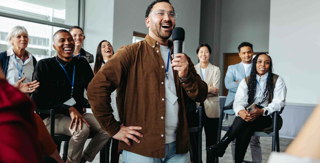 A,Speaker,Engaging,With,An,Enthusiastic,Audience,During,A,Business